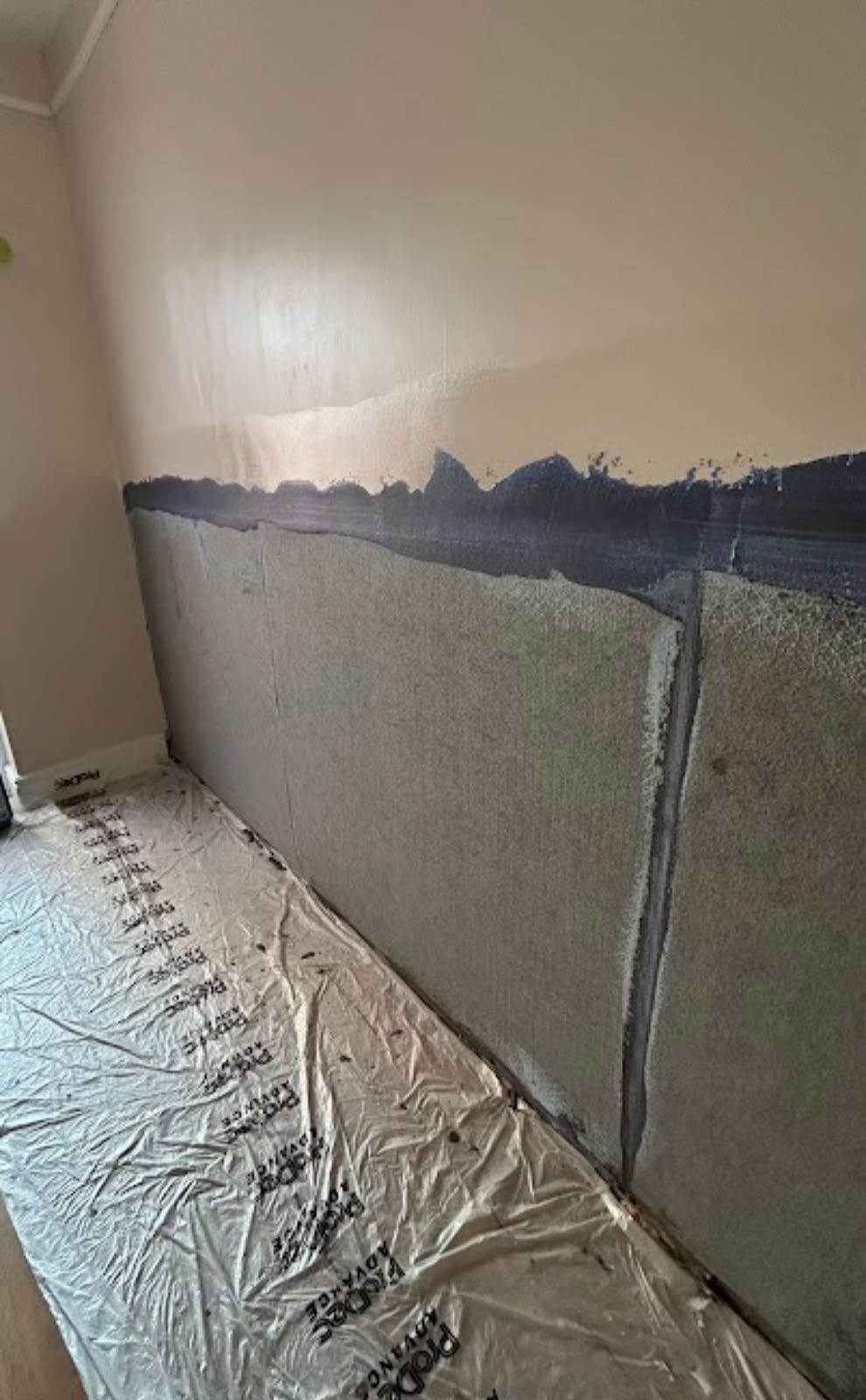 Damp proofing render applied to wall