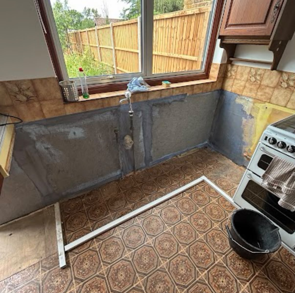 Kitchen damp proofing tanking render applied to walls